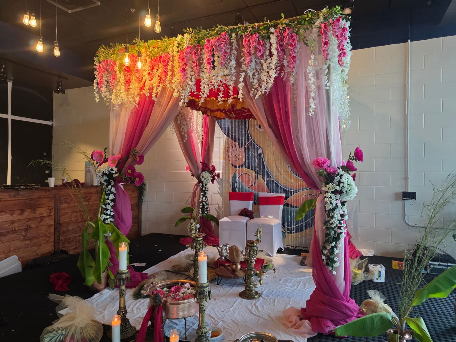 Pink floral mandap canopy decorated for a Nepali wedding ceremony